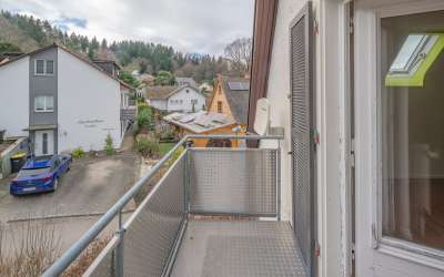 Das charmante Dreifamilienhaus am Ortsrand mit kurzen Wegen ins Grüne und einer enormen Aussicht