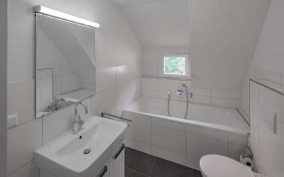 Das charmante Dreifamilienhaus am Ortsrand mit kurzen Wegen ins Grüne und einer enormen Aussicht