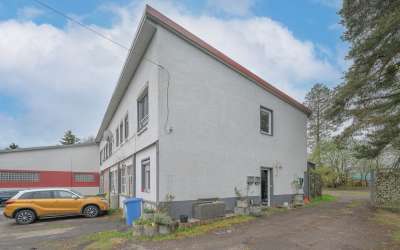 2 Zimmer Eigentumswohnung mit einer angrenzenden Werkstatt