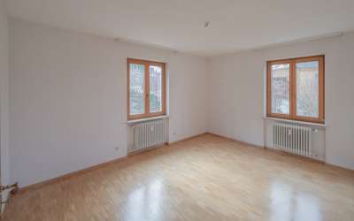 Das charmante Dreifamilienhaus am Ortsrand mit kurzen Wegen ins Grüne und einer enormen Aussicht