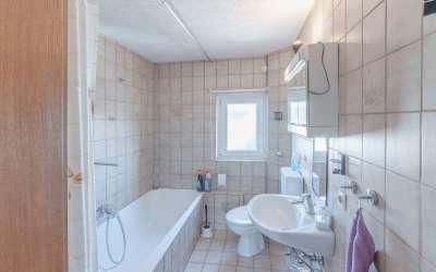 Zentral gelegene 4-Zimmer-Eigentumswohnung mit Garten und Garage